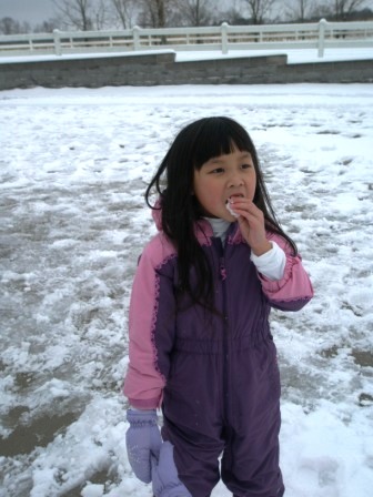 Kasen eating some snow